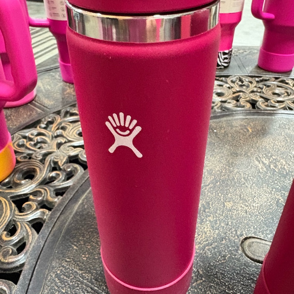 Hydro flask snapper wide mouth water bottle, it’s 24 ounces and includes boot.
